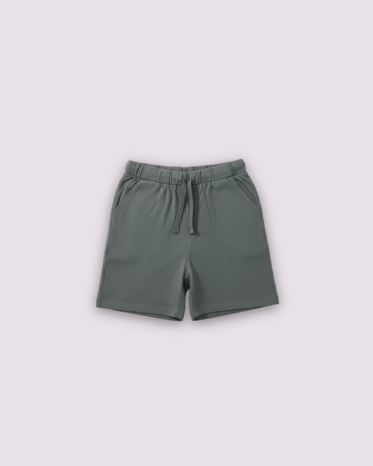 Soft olive green kids jersey cotton shorts with elastic waistband and drawstring detail