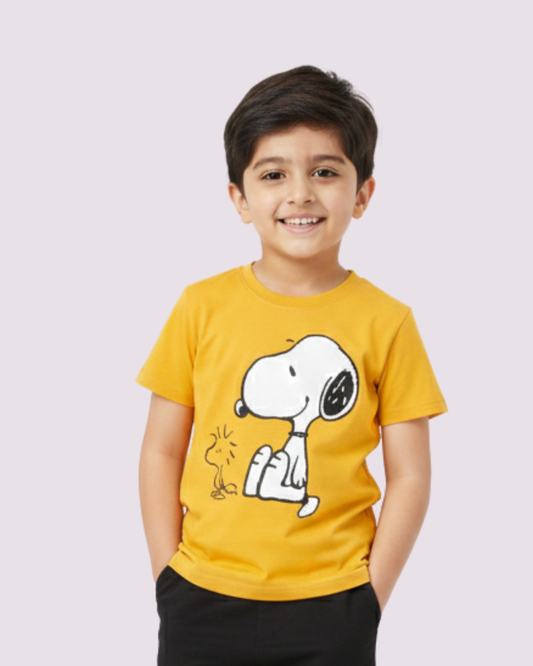 Kids yellow t-shirt featuring Snoopy cartoon graphic print on front.
