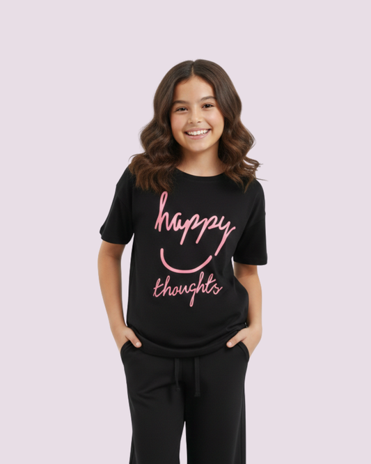 Trendy black shirt with glowing pink happy thoughts lettering